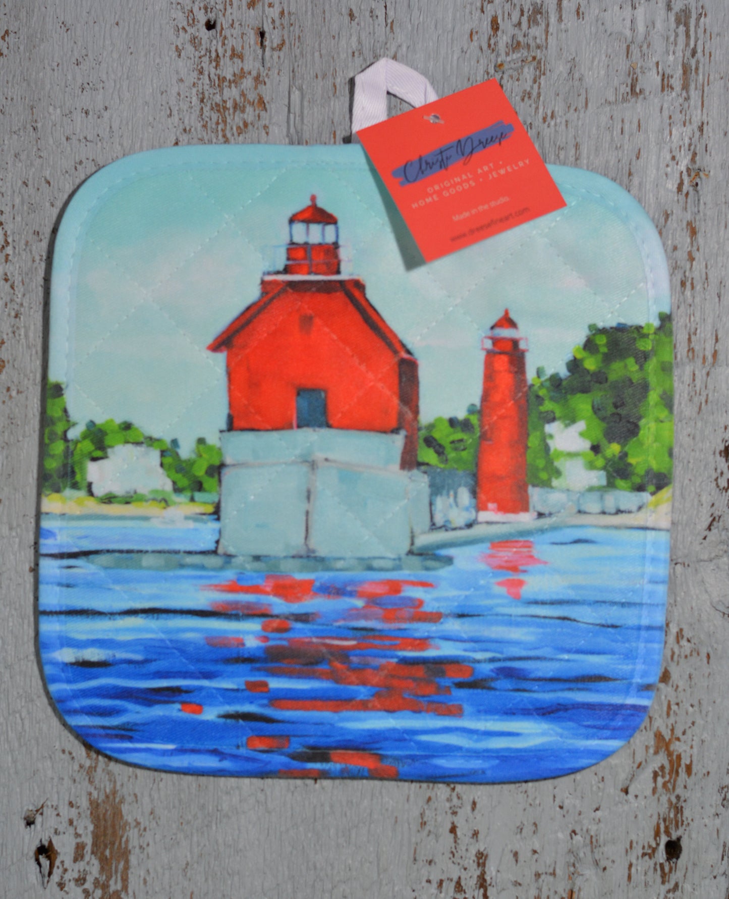 Potholder: Lake View: Grand Haven Lighthouse. Artist Christi Dreese